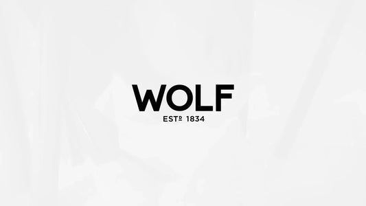 Official WOLF 1834 brand logo featuring bold black typography and the established date