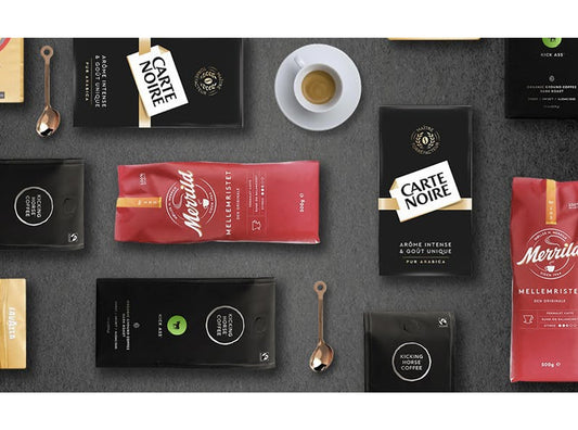 Premium Lavazza Italian coffee products and accessories displayed for a professional brewing experience at home