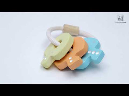 Schlüssel-Rassel pastell