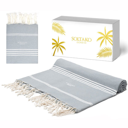 eine pastellgraue Hamamtuch Fouta mit Weiß und Gold